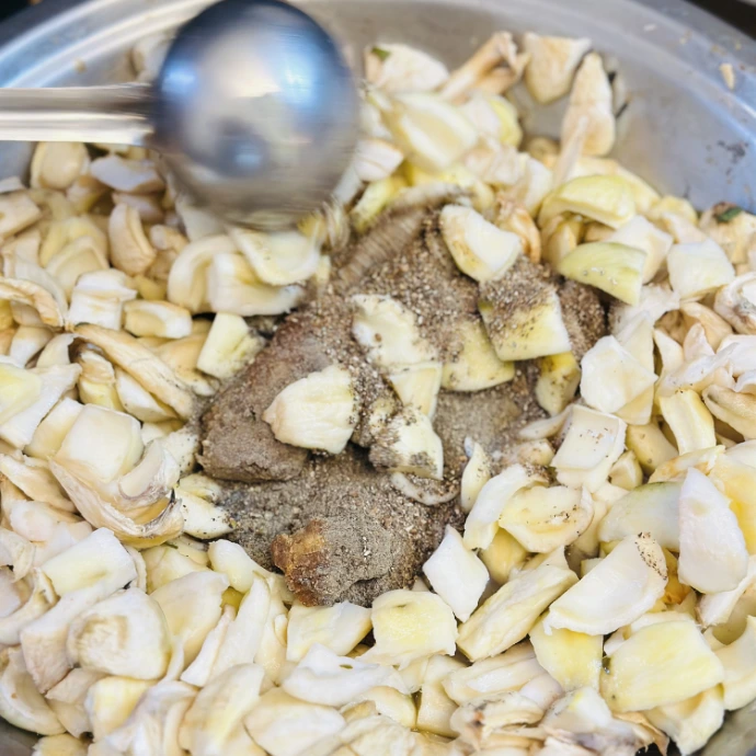 Falahari Aamra fasting mango pickle ingredients with raw mango, rock salt, black pepper, cloves, black cardamom, cumin seeds and desi khand. Maatru Rasah.