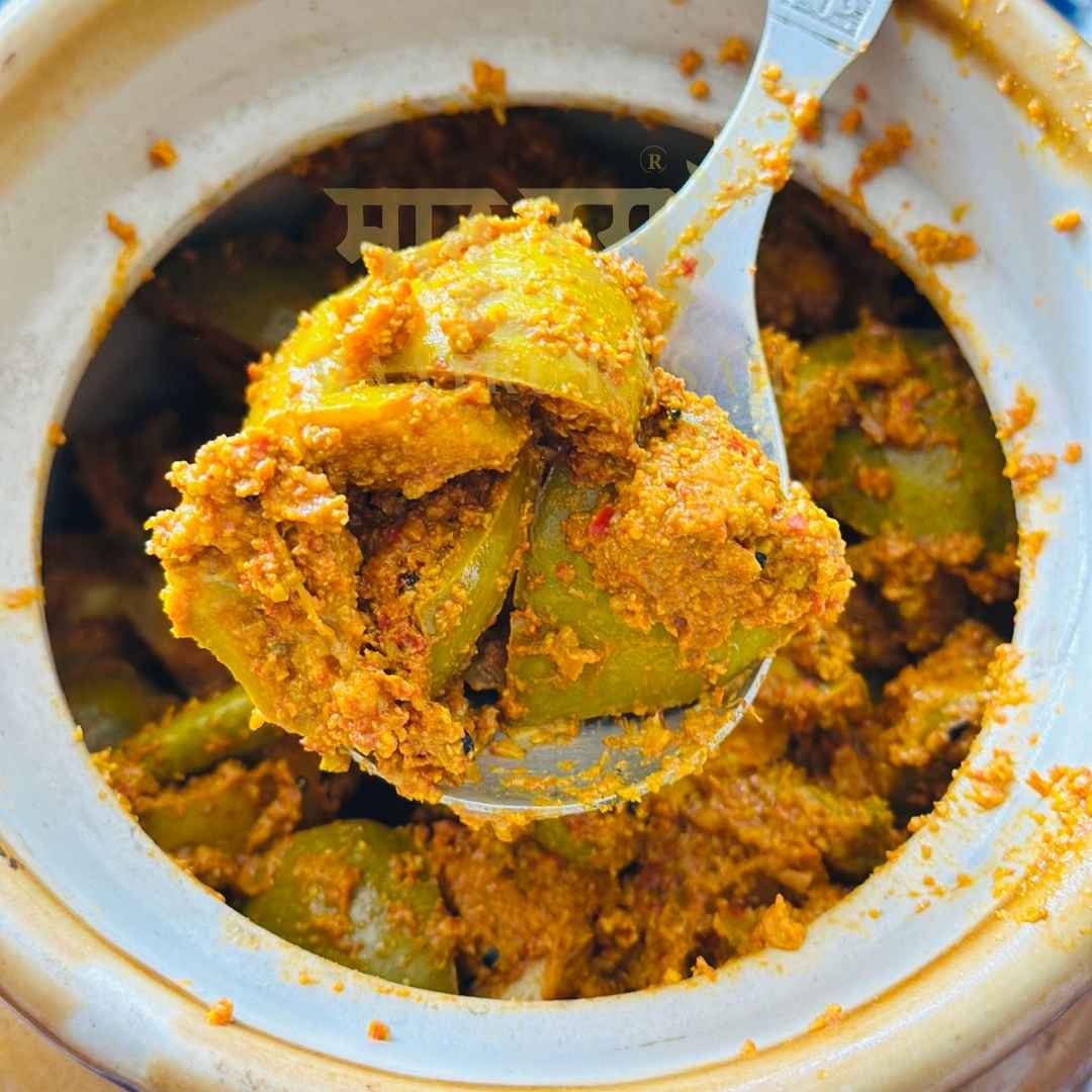 Storing achaar with a dry spoon to keep a preservative-free jar fresh. Maatru Rasah