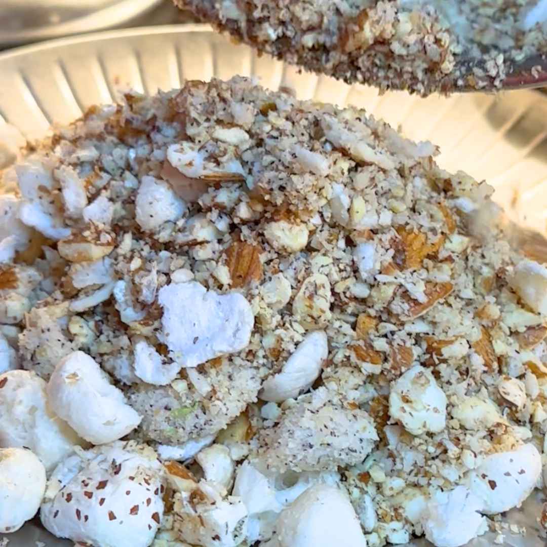 Roasting makhana and dry fruits in desi ghee for Harira